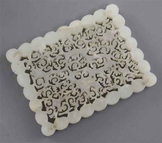 A Chinese white jade rectangular dragon plaque, 17th / 18th century, 5.5 x 7.4cm